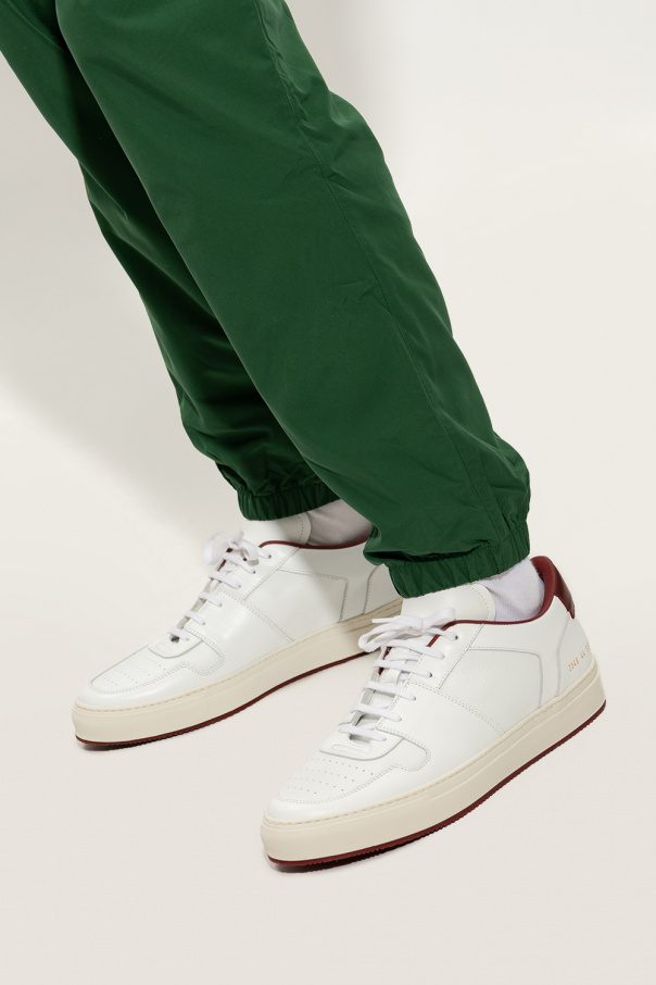 Common projects red on sale sneakers